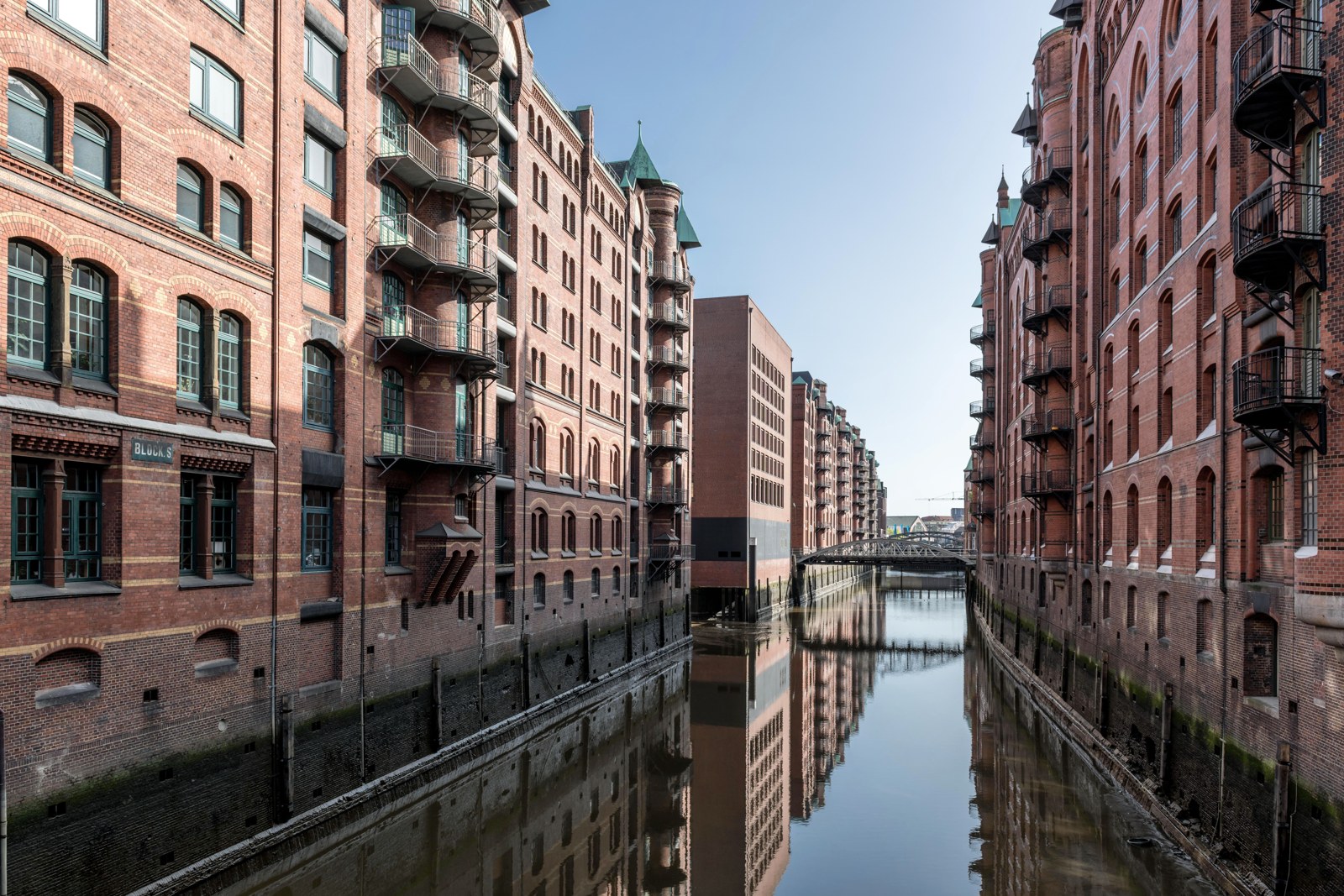 Brick warehouses beside a canal in Hamburg's Speicherstadt