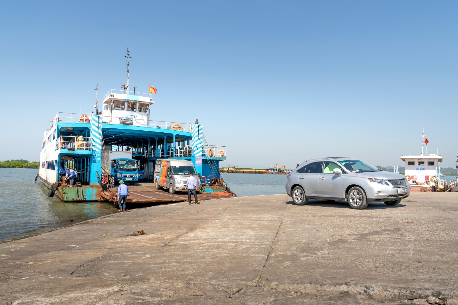 Cars boarding a ferry