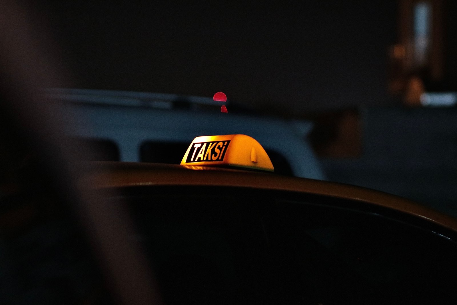 Taxi in a city at night