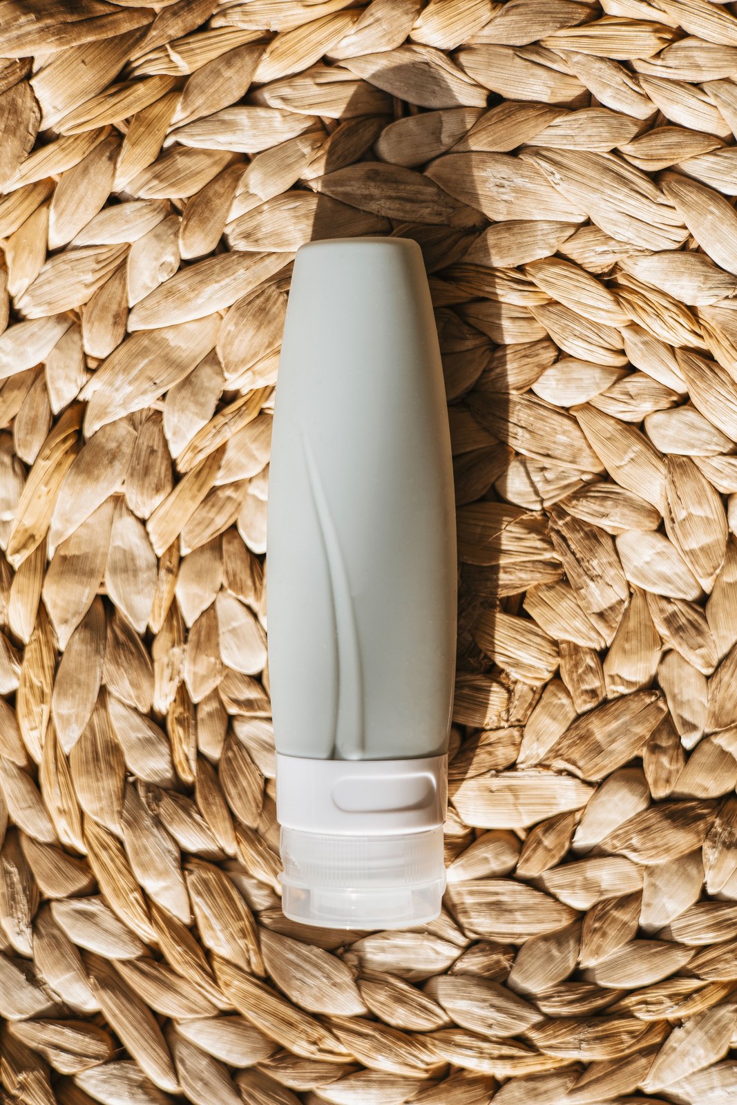 Refillable silicone travel bottle