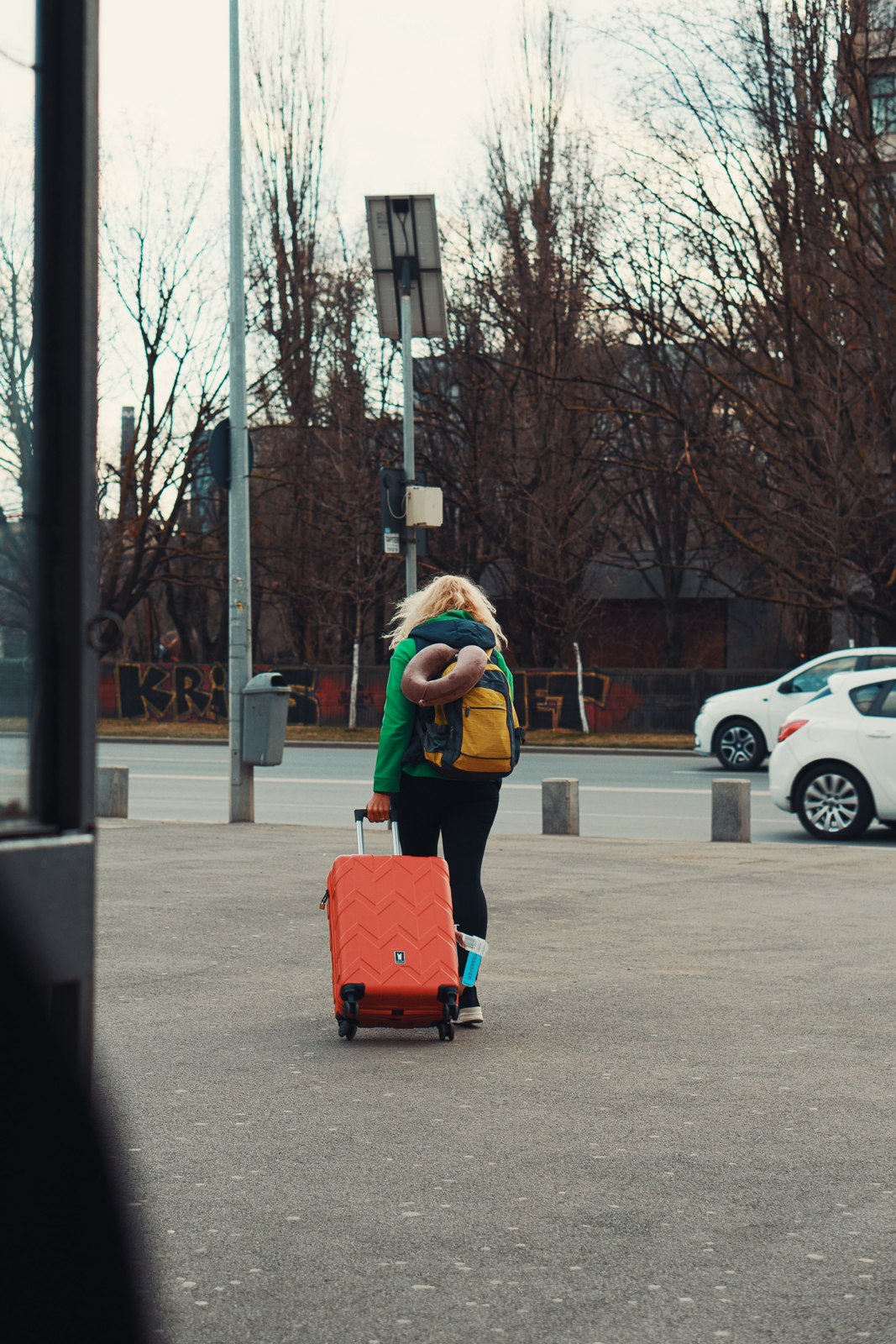 Traveller walking with a suitcase
