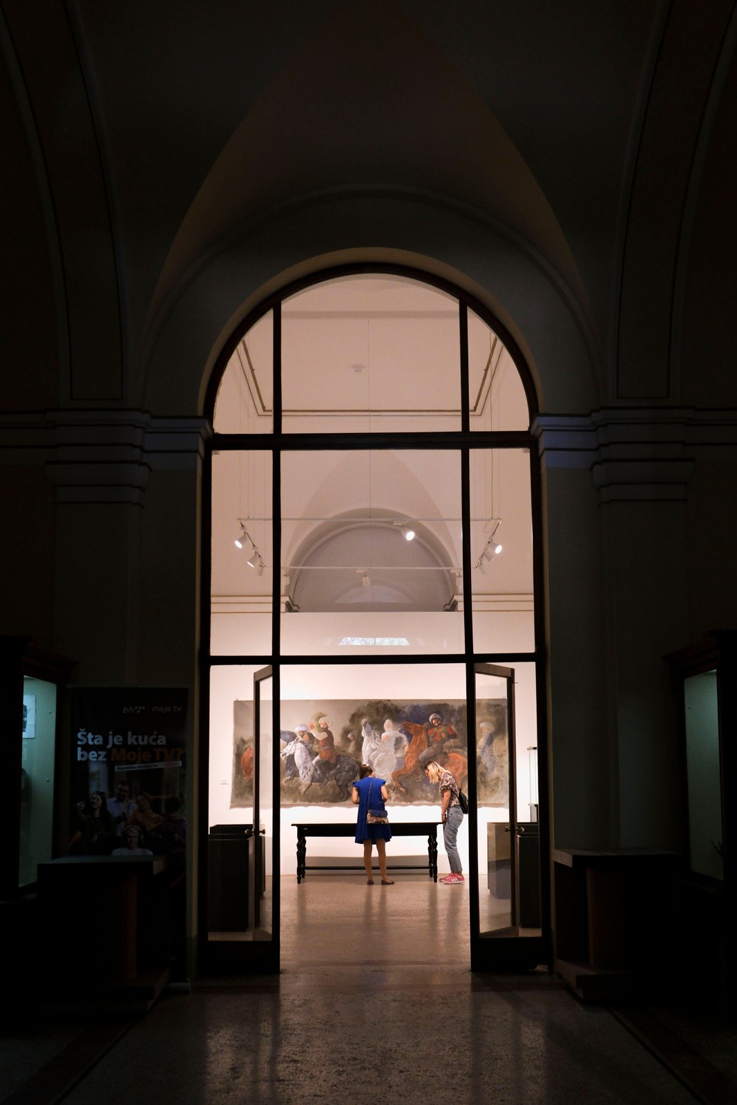Visitors in a museum gallery