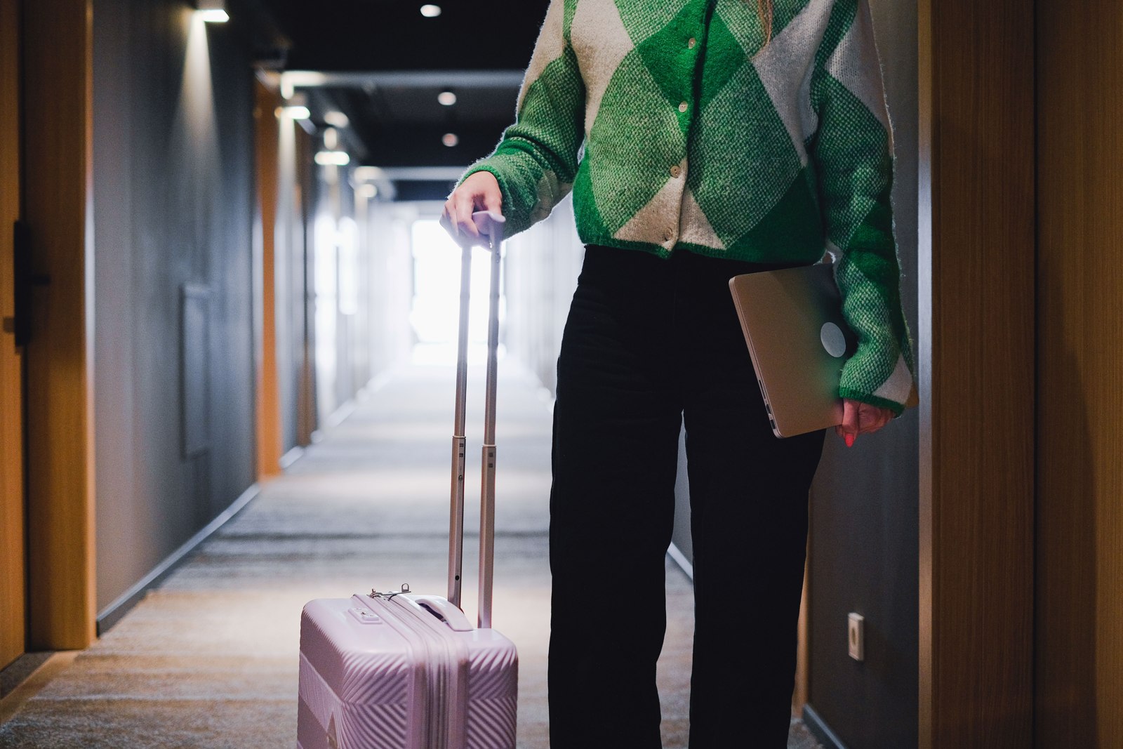 Traveller with laptop and luggage